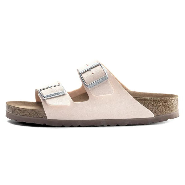 Beige sandal with a white sole on a white background