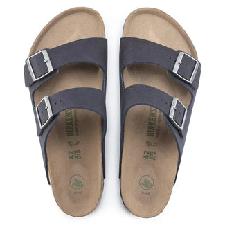 Navy sandal with cork sole on a white background