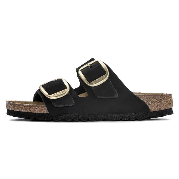 Black sandal with cork sole on a white background