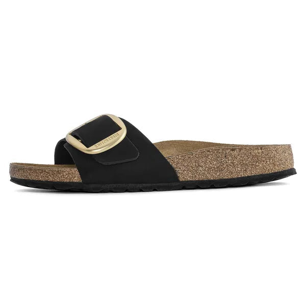 Black sandal with cork sole on a white background