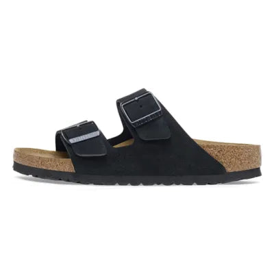 Black sandal with cork sole on a white background