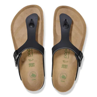 Black sandal with cork sole on a white background