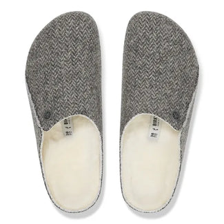 Gray slipper with a white stripe on a white background
