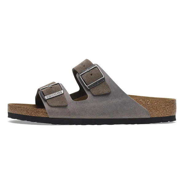 Brown sandal with cork sole on a white background