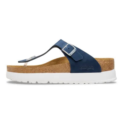 Blue sandal with cork sole on a white background