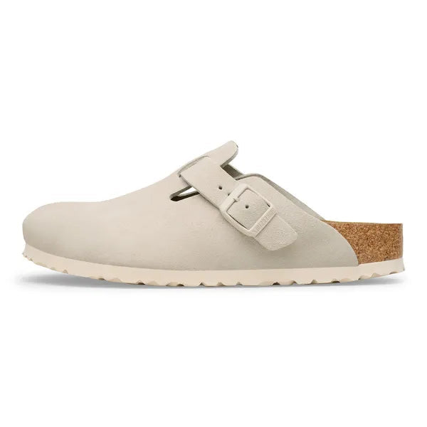 Beige sandal with cork sole on a white background