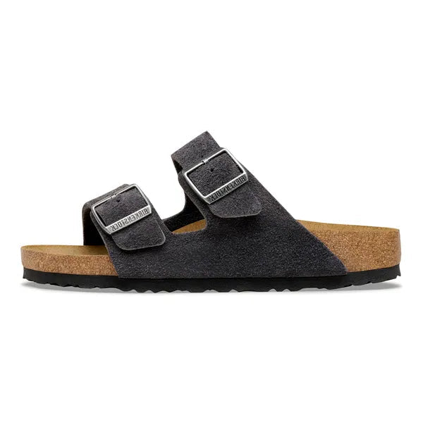 Black sandal with cork sole on a white background