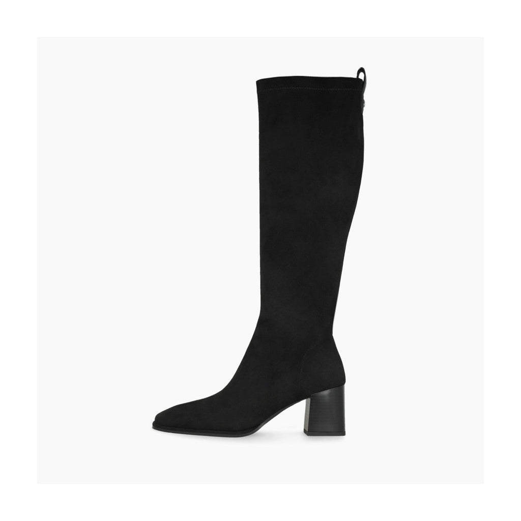 Black knee-high boot on a light gray background