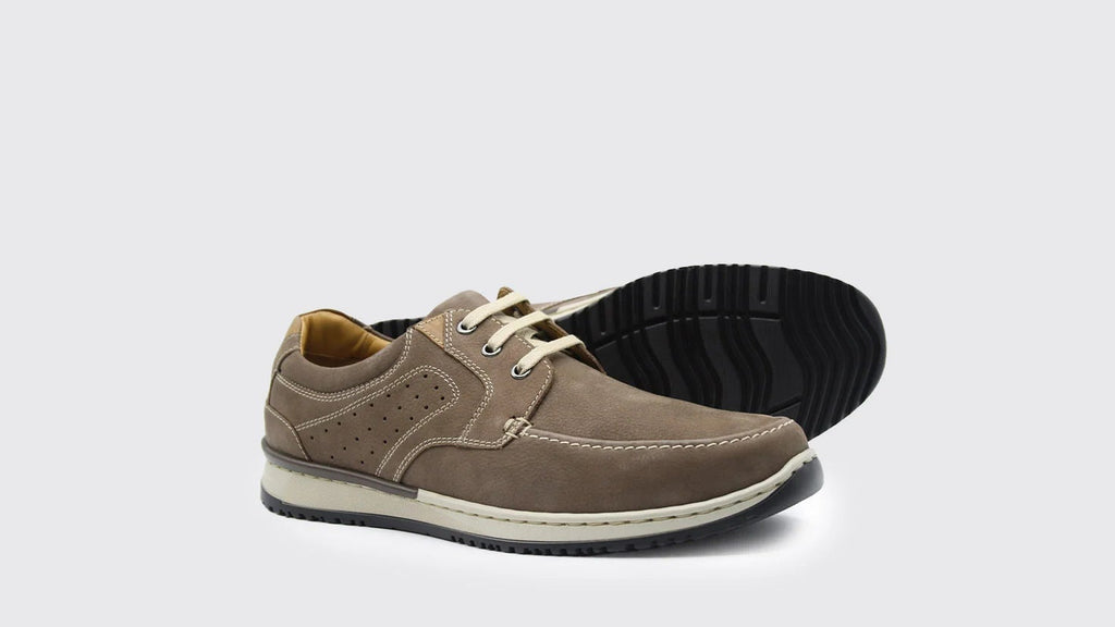 Brown casual shoe on a white background