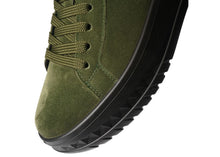 Load image into Gallery viewer, Green sneaker with black sole on a white background

