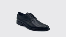Load image into Gallery viewer, Black leather dress shoe on a light gray background
