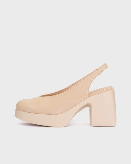 Beige platform sandal on a light beige background