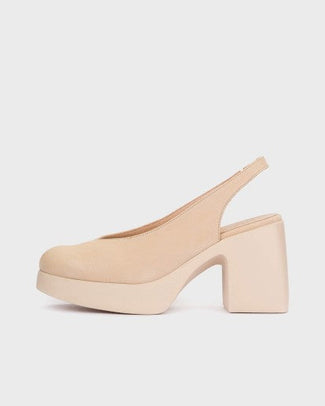 Beige platform sandal on a light beige background