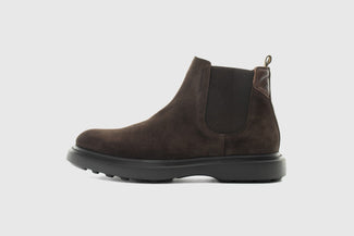 Brown suede Chelsea boot on a light gray background