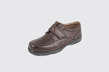 Load image into Gallery viewer, Brown leather shoe with velcro straps on a light gray background
