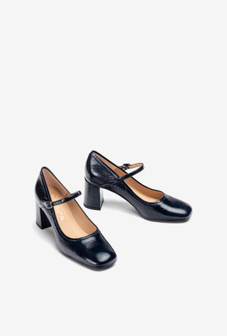 Black high-heeled shoe on a white background