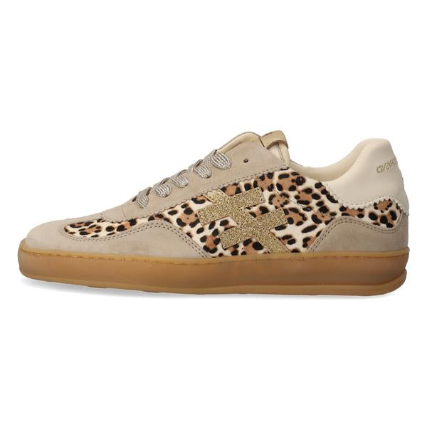 Beige sneaker with leopard print pattern on a white background