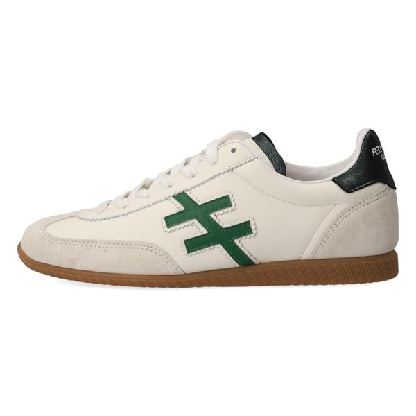 White sneaker with green logo and brown sole on a white background