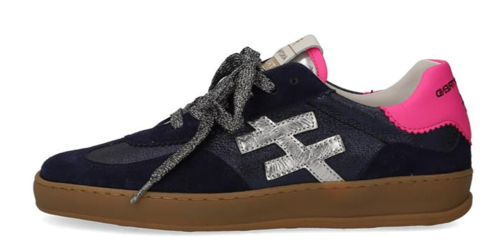 another trend Navy blue sneaker with pink heel and brown sole on a white background