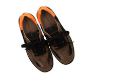 Load image into Gallery viewer, Pair of brown shoes with orange soles on a white background
