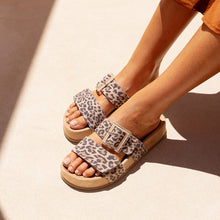 Load image into Gallery viewer, Leopard print sandals worn on a sandy background
