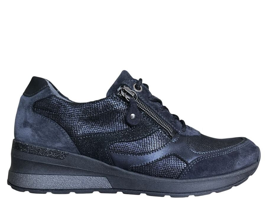 Navy blue sneaker with a zipper on a white background